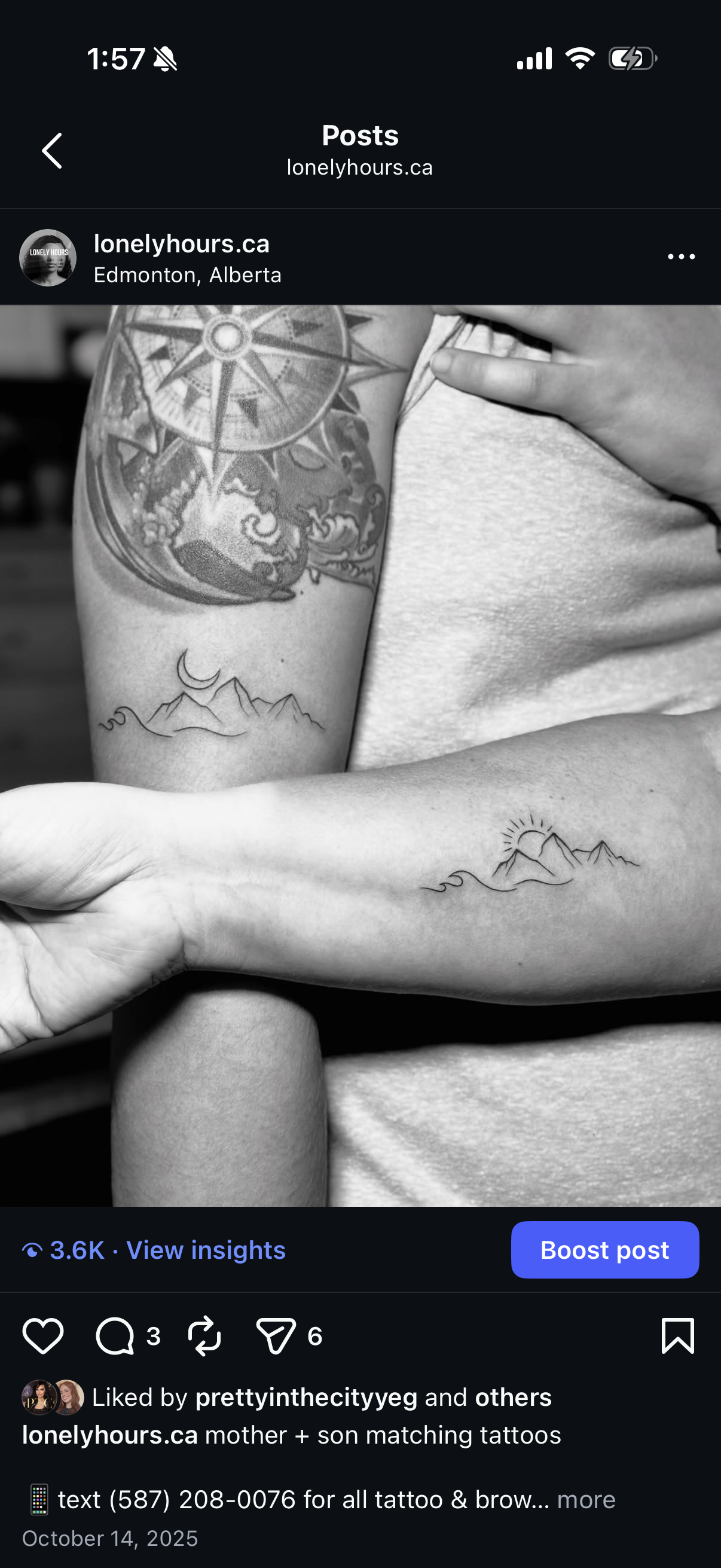 Black and white photo of a mother and son with matching mountain and sun tattoos on their forearms.