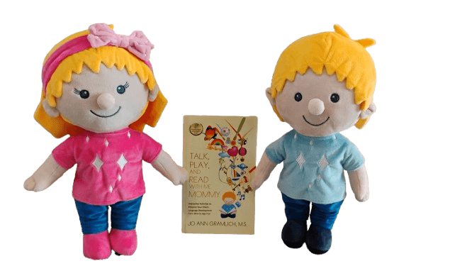 Ruby and Louie plush toys standing beside the book Talk, Play, and Read with Me Mommy