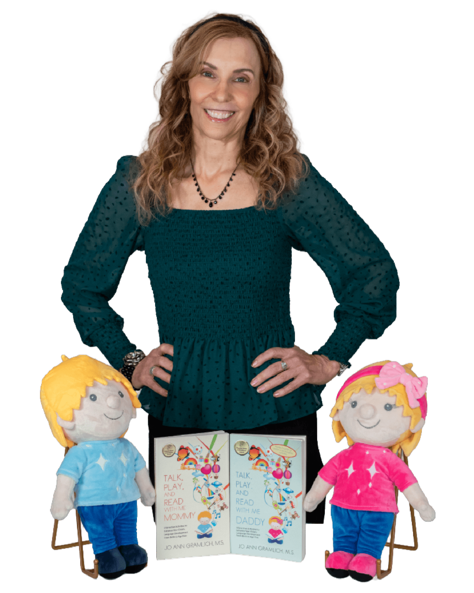 A woman with curly blonde hair wearing a teal blouse with polka dots, smiling and standing behind two plush dolls and two children's books about reading and talking with mommy and daddy.