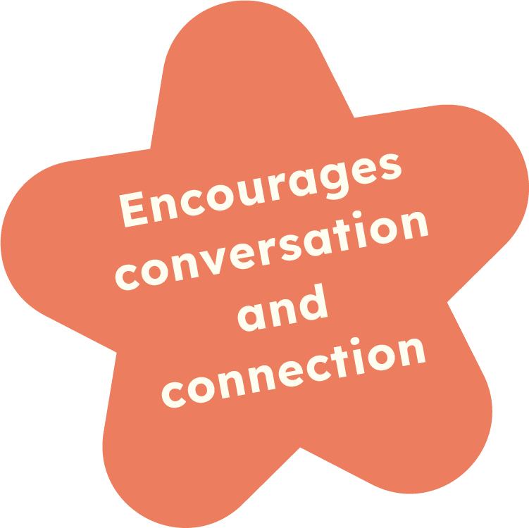 A star-shaped orange sign with white text that says, 'Encourages conversation and connection.'