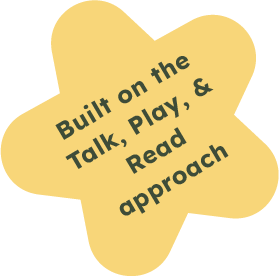 A yellow cloud-shaped speech bubble with black text that reads 'Built on the Talk, Play, & Read approach'.