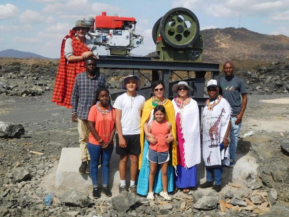 Ltungai Rock crusher installation team.