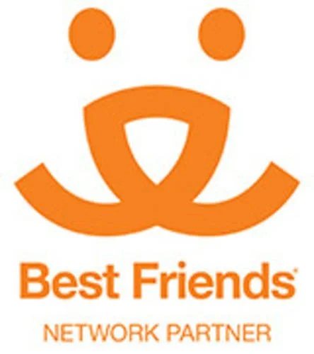 Orange animal face logo with two ears above, a nose, and a wide smiling mouth, with text 'Best Friends Network Partner' underneath.