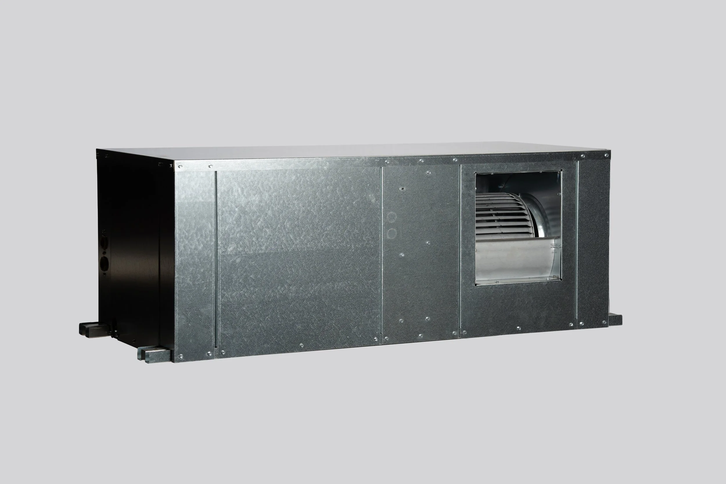 A rectangular HVAC air handling unit with a metal exterior and a visible blower fan inside an opening