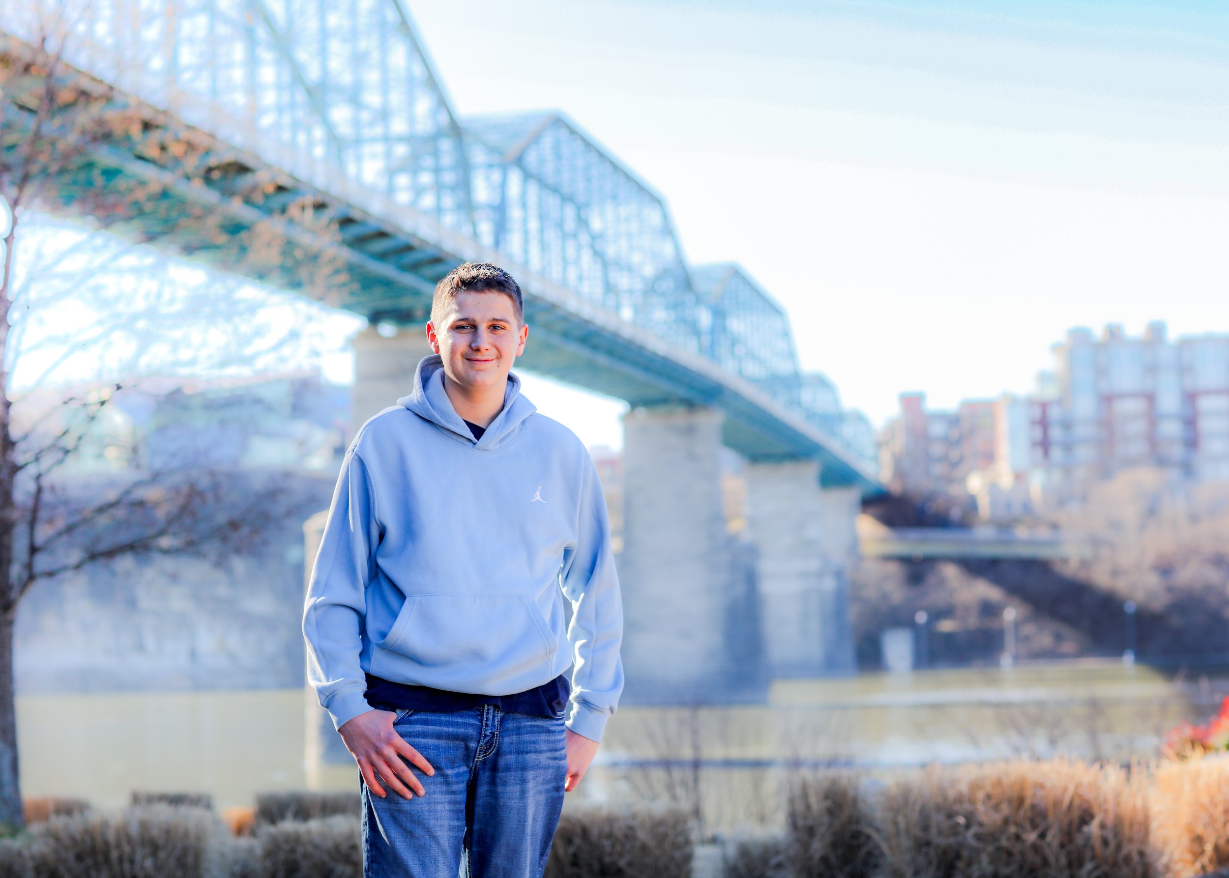 Male Senior photo downtown Chattanooga,TN, blue bridge 