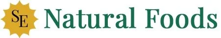 Natural Foods logo with green text and a gold starburst with 'SE' inside