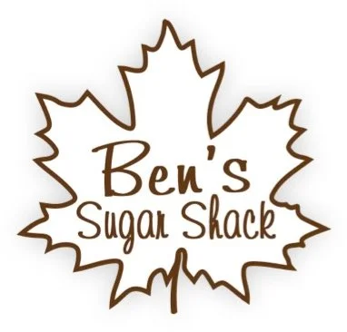 Logo for Ben's Sugar Shack with a maple leaf outline and stylized text.