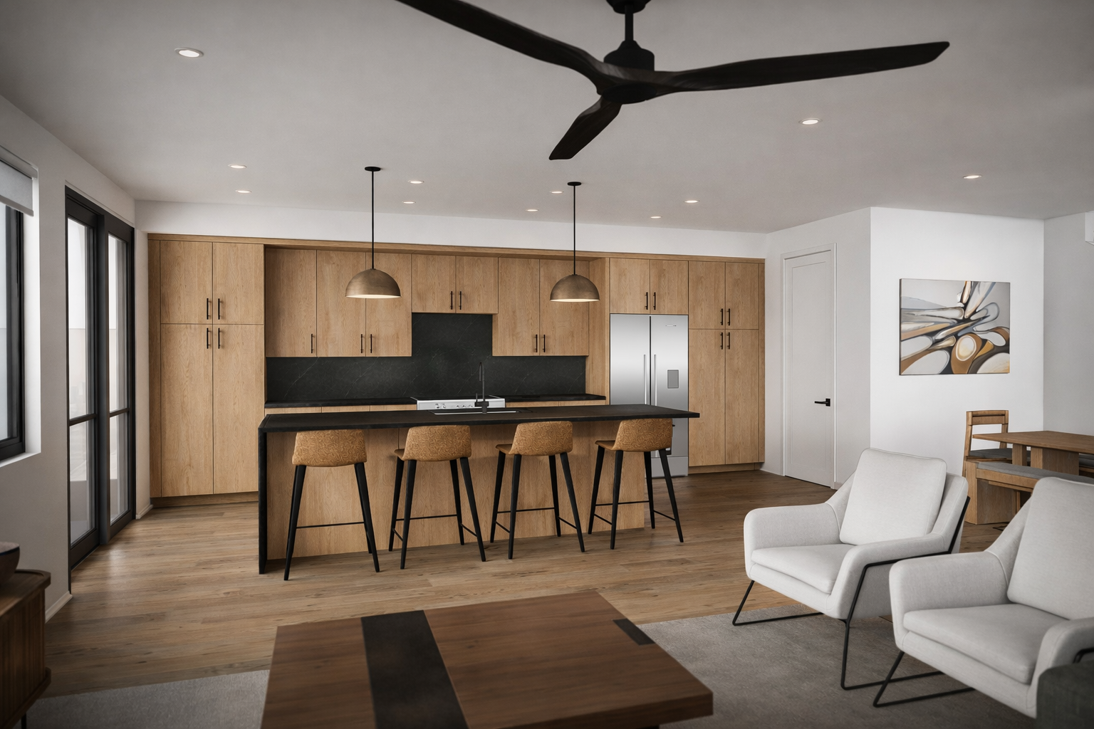 Open-concept kitchen with wooden cabinets, black countertops, a kitchen island with bar stools, a stainless steel refrigerator, and dining area with white armchairs and a wooden table.