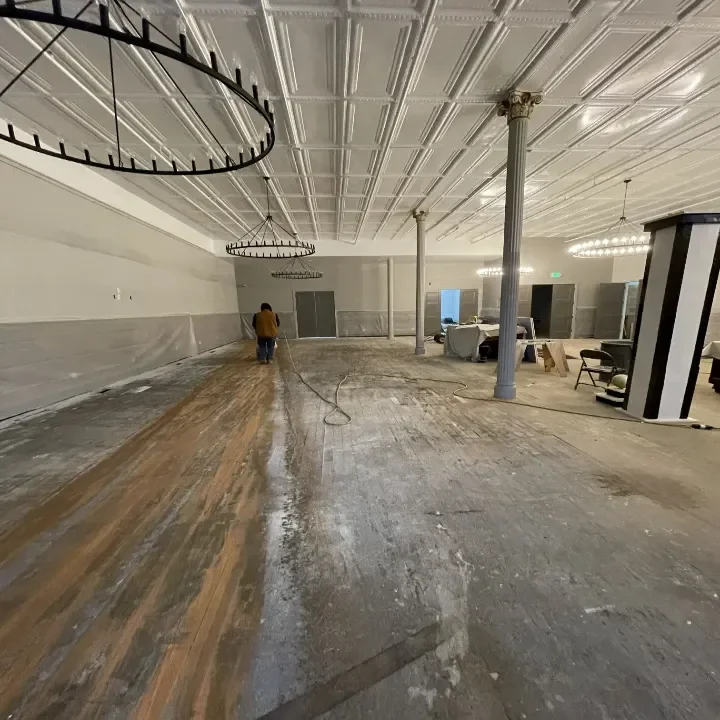 A hardwood floor in an event room being sanded at a hotel in Paris, KY.