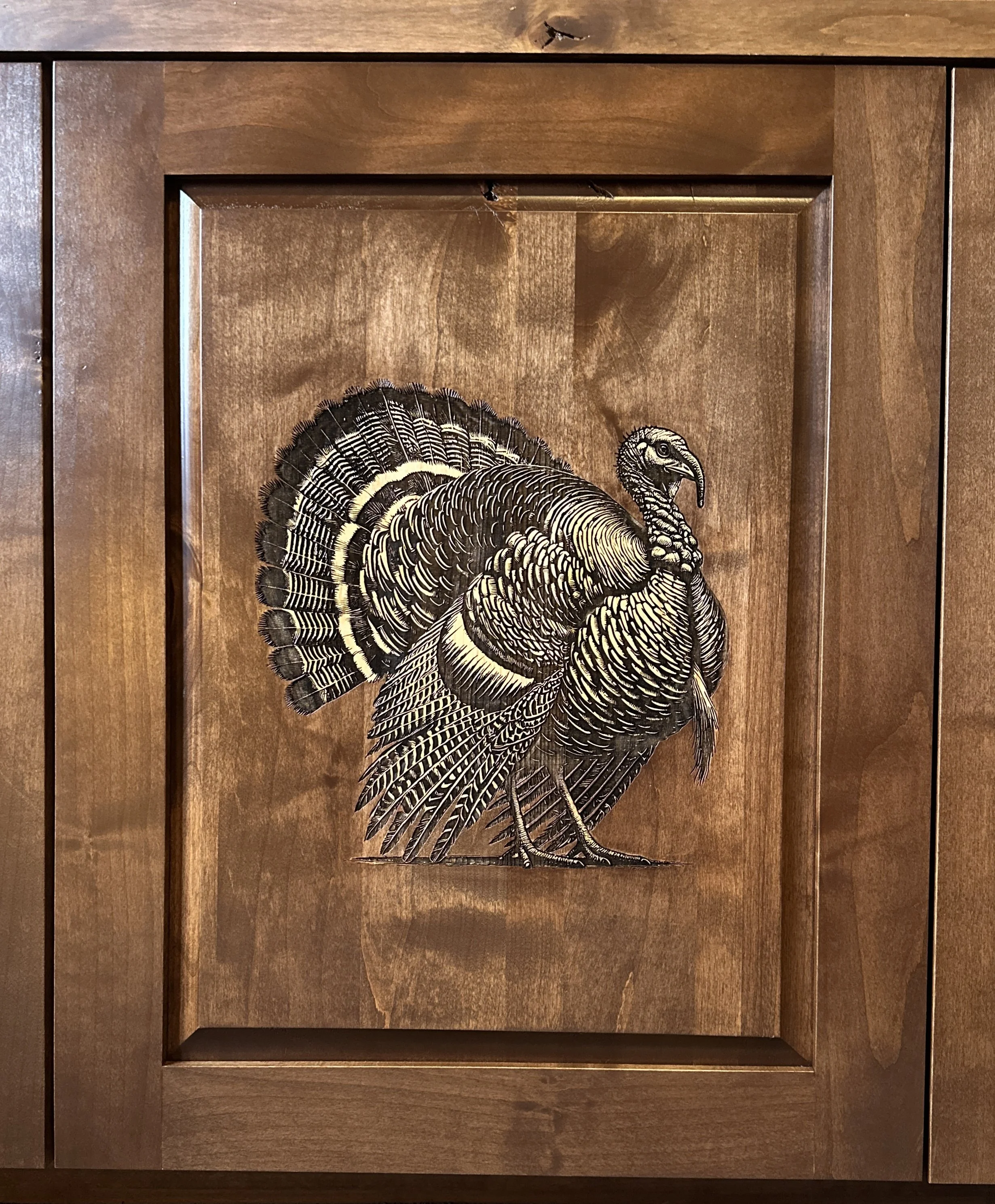 Wooden box with a detailed black and white illustration of a turkey on its front panel.