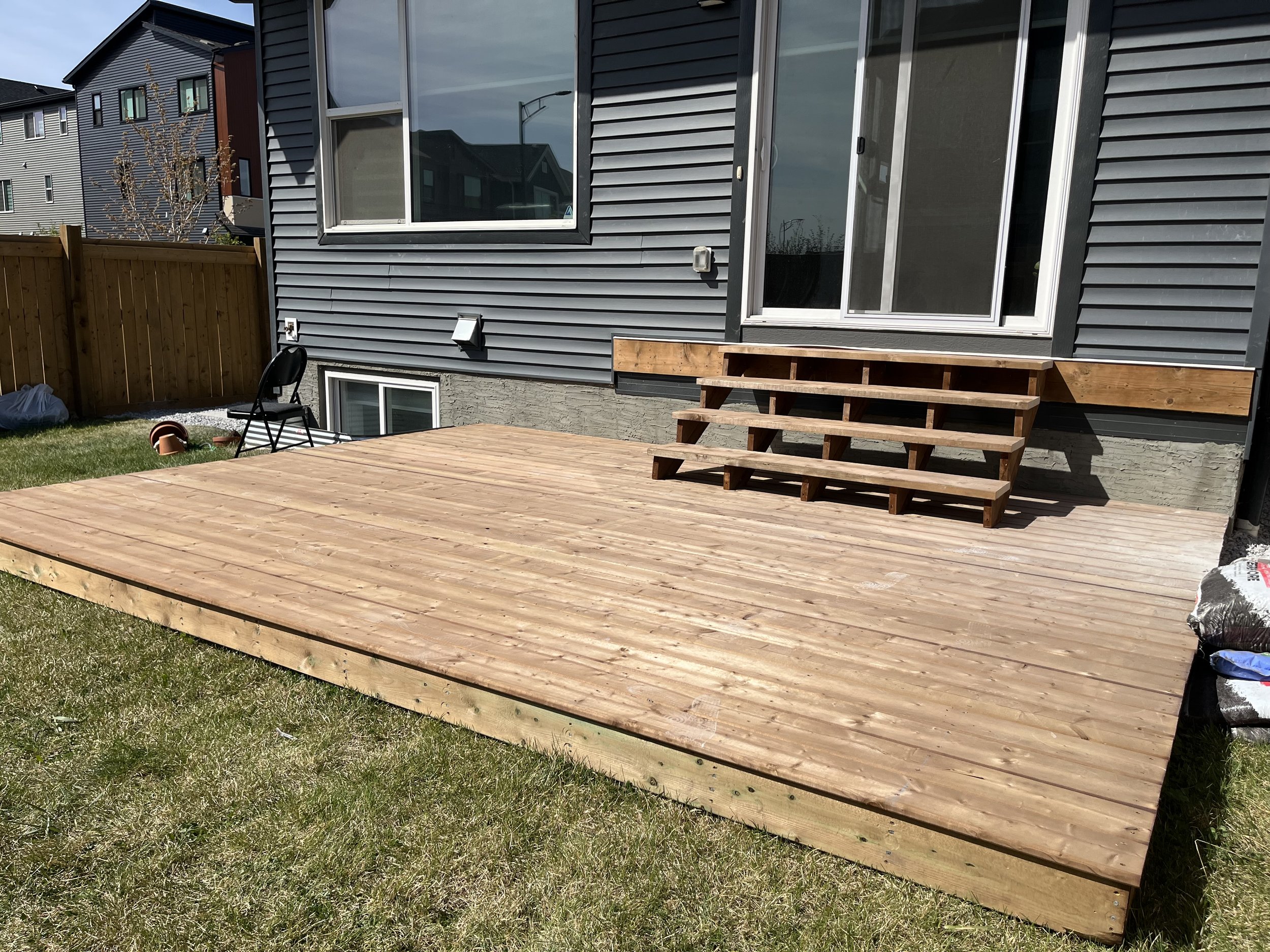 Pressure treated ground deck, Leduc