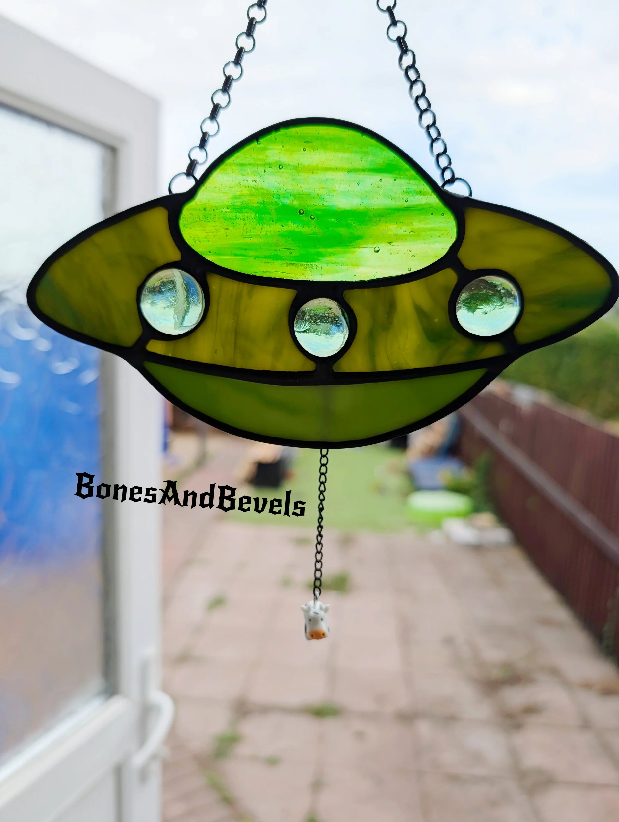UFO Suncatchers with cow charm