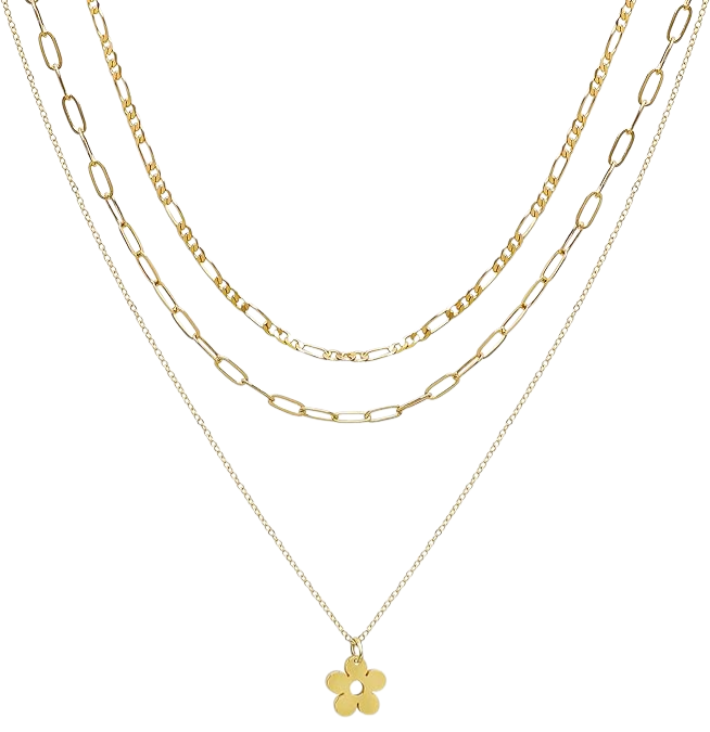 Three gold-colored layered necklaces with chain links and a flower pendant on the bottom necklace against a black background.