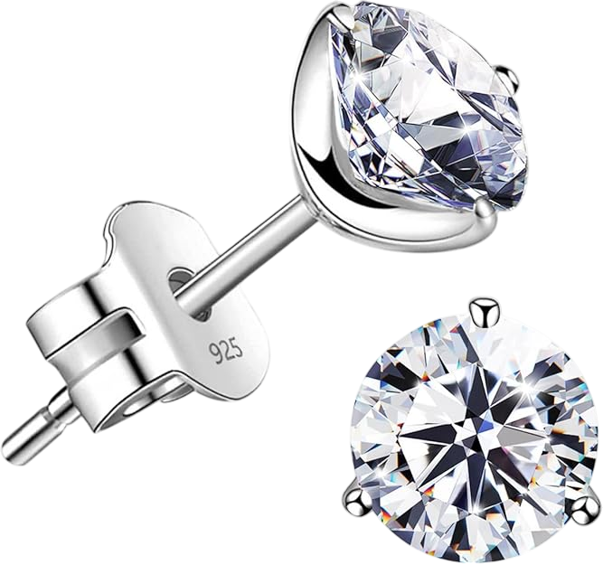 Close-up of a silver stud earring with a large, sparkling diamond gemstone set in a prong setting.