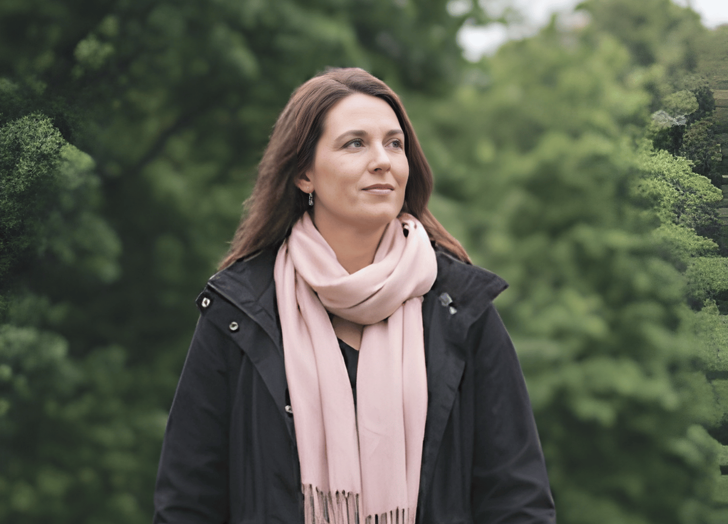 Woman standing peacefully outdoors representing healing through trauma-informed therapy for women at Throughline Psychotherapy in Raleigh, NC