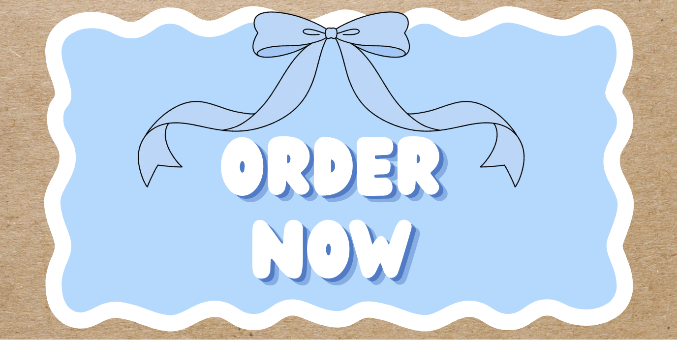 A sign with the words 'Order Now' in bold, white, cartoon-style letters on a light blue background, decorated with a drawn blue bow at the top, and a wavy white border, set against a brown textured surface.