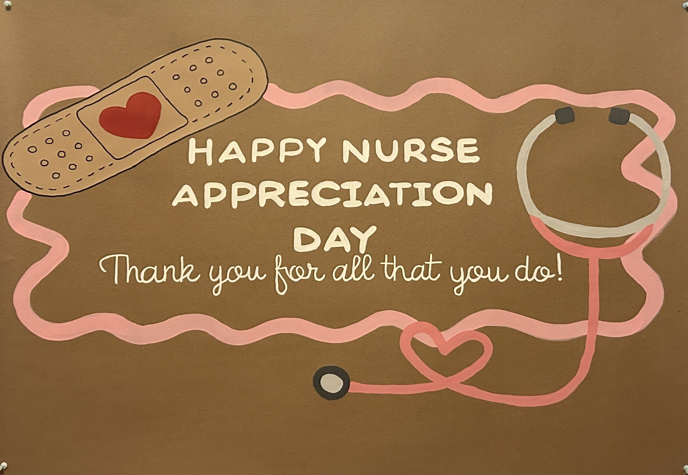 Illustration of a stethoscope with a pink tubing, a heart on a bandage or adhesive strip, and the text 'Happy Nurse Appreciation Day. Thank you for all that you do!' on a brown background.