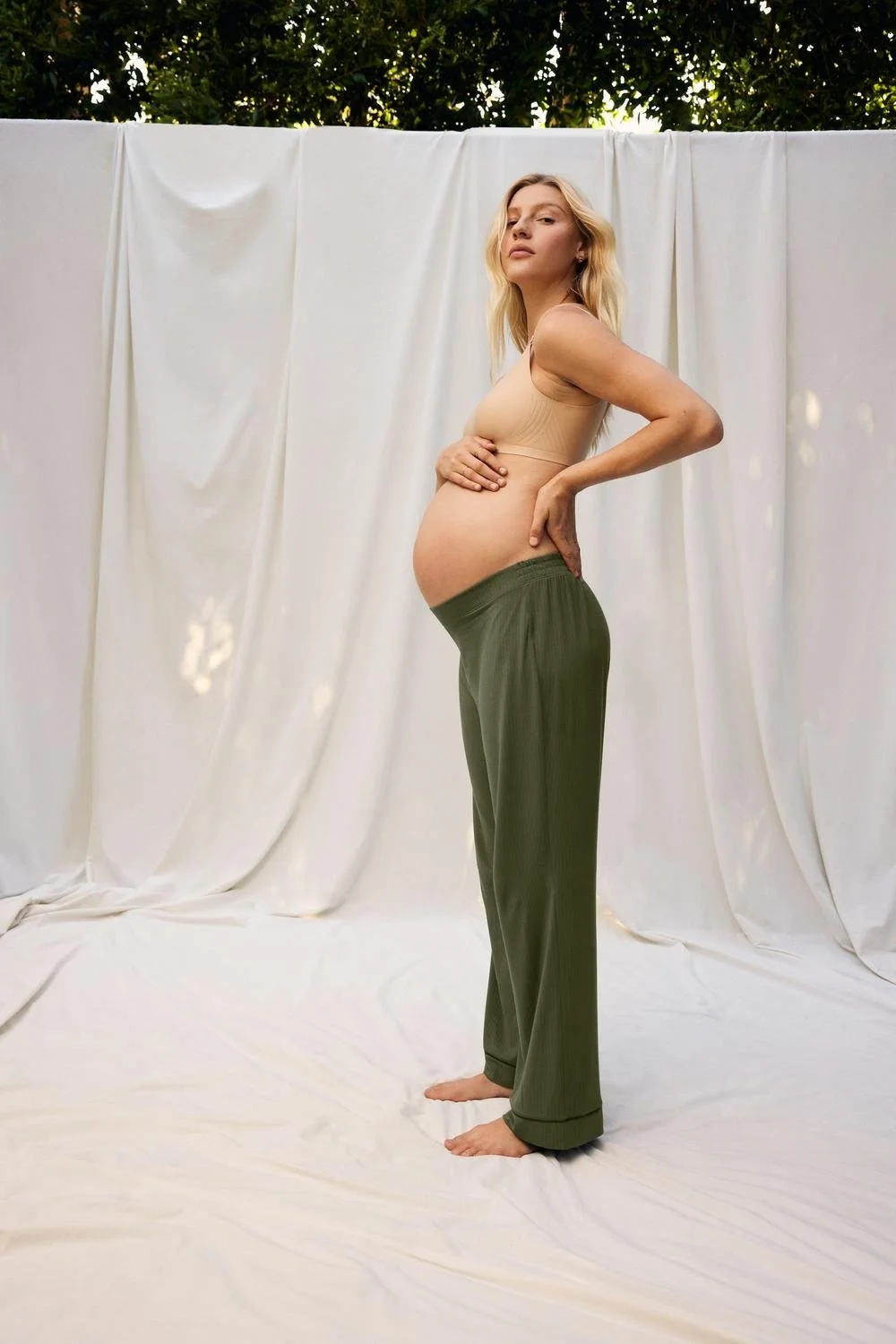 Knix_OnFig-Lifestyle_Holiday-2024_Studio-Set_Revolution-Nursing-Bra-Warm-Sand_Quintessential-Sleep-Set-LP-Boyshort-Olive-Warm-Sand_1228-copy.jpg