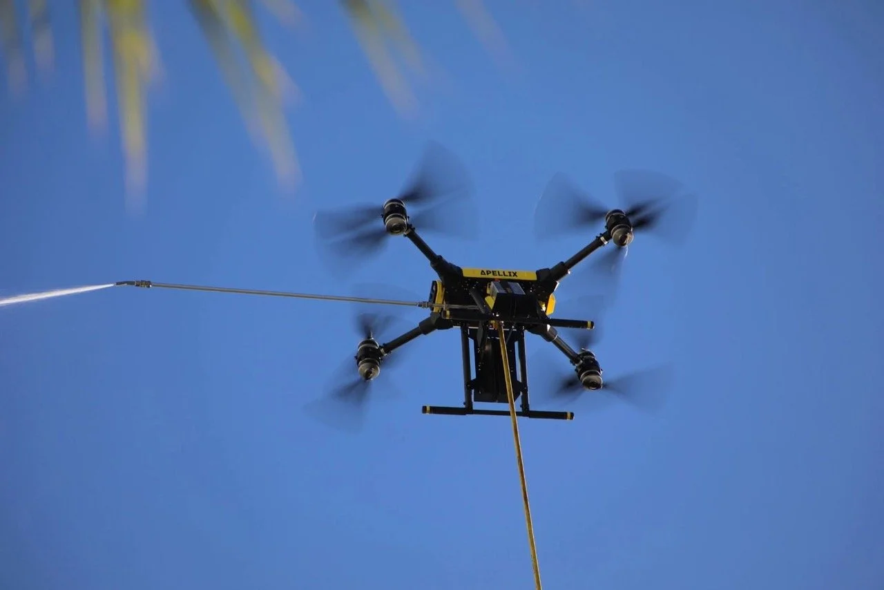 commercial-exterior-cleaning-drone-spraying-hawaii.jpeg