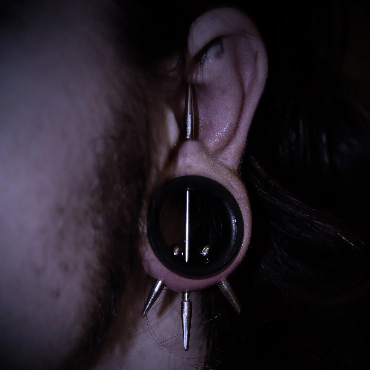 Transverse lobe body piercing. This was the piercing that got me my first artist interview in Tattoo Savage Magazine.
