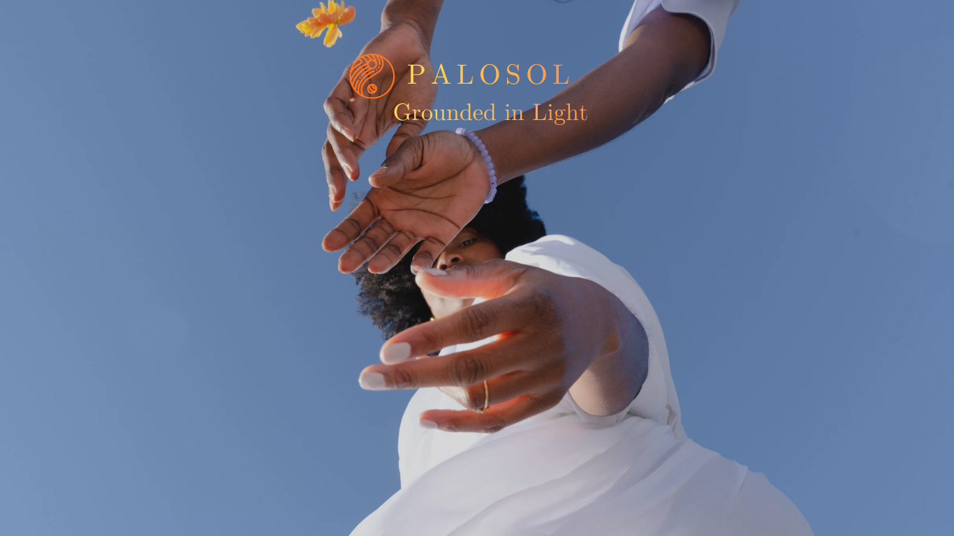 A person with dark skin reaching out with both hands toward the camera, with a clear blue sky in the background. The person has curly hair and is wearing a white outfit and a light purple bracelet. The image includes the words "PALOSOL Grounded in Light" in orange and yellow text overlaid on the scene.