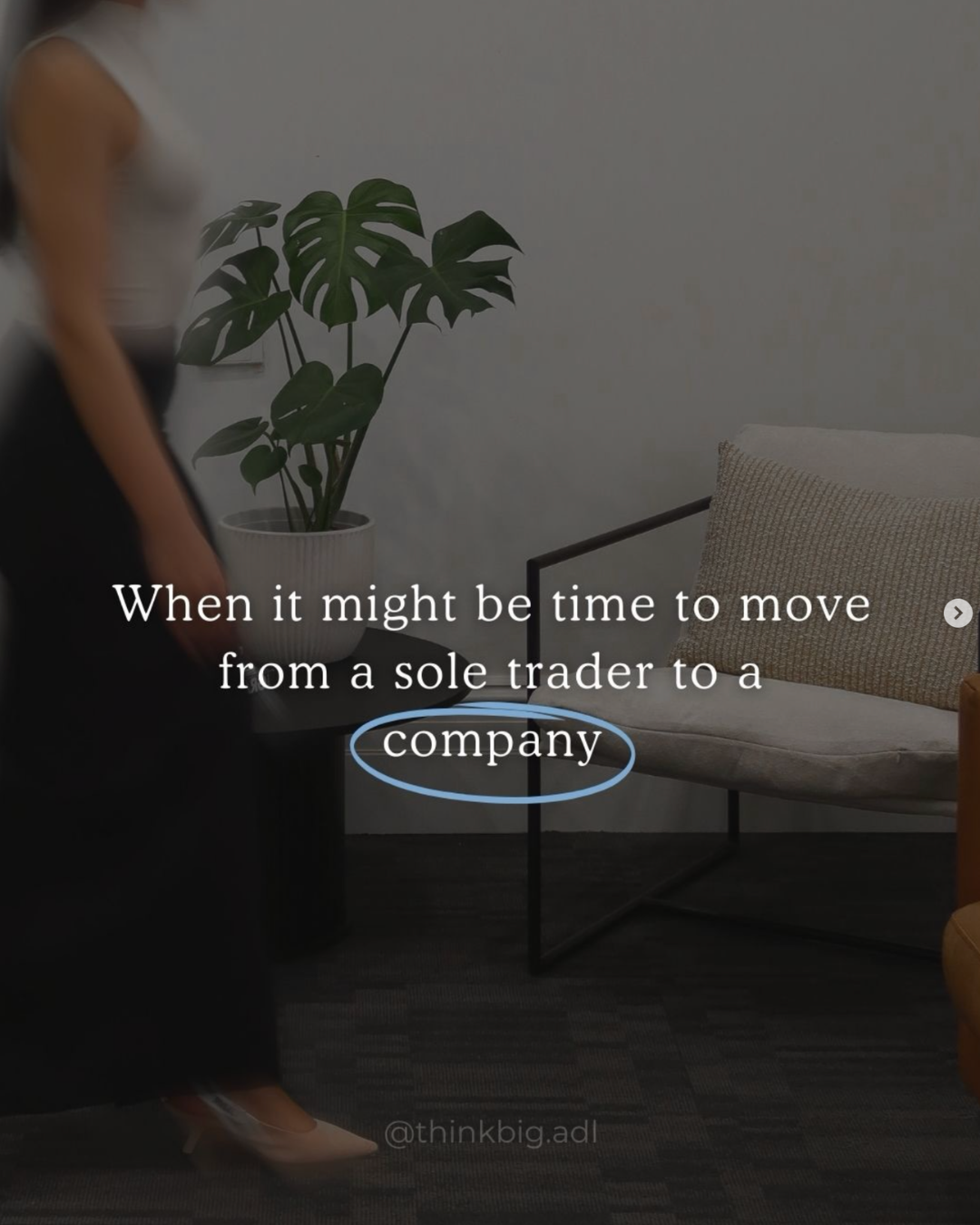 An indoor scene with a person on the left, a large potted plant with green leaves on a table, and a beige cushioned chair on the right. Overlaid text reads 'When it might be time to move from a sole trader to a company,' with the word 'company' circled in blue.