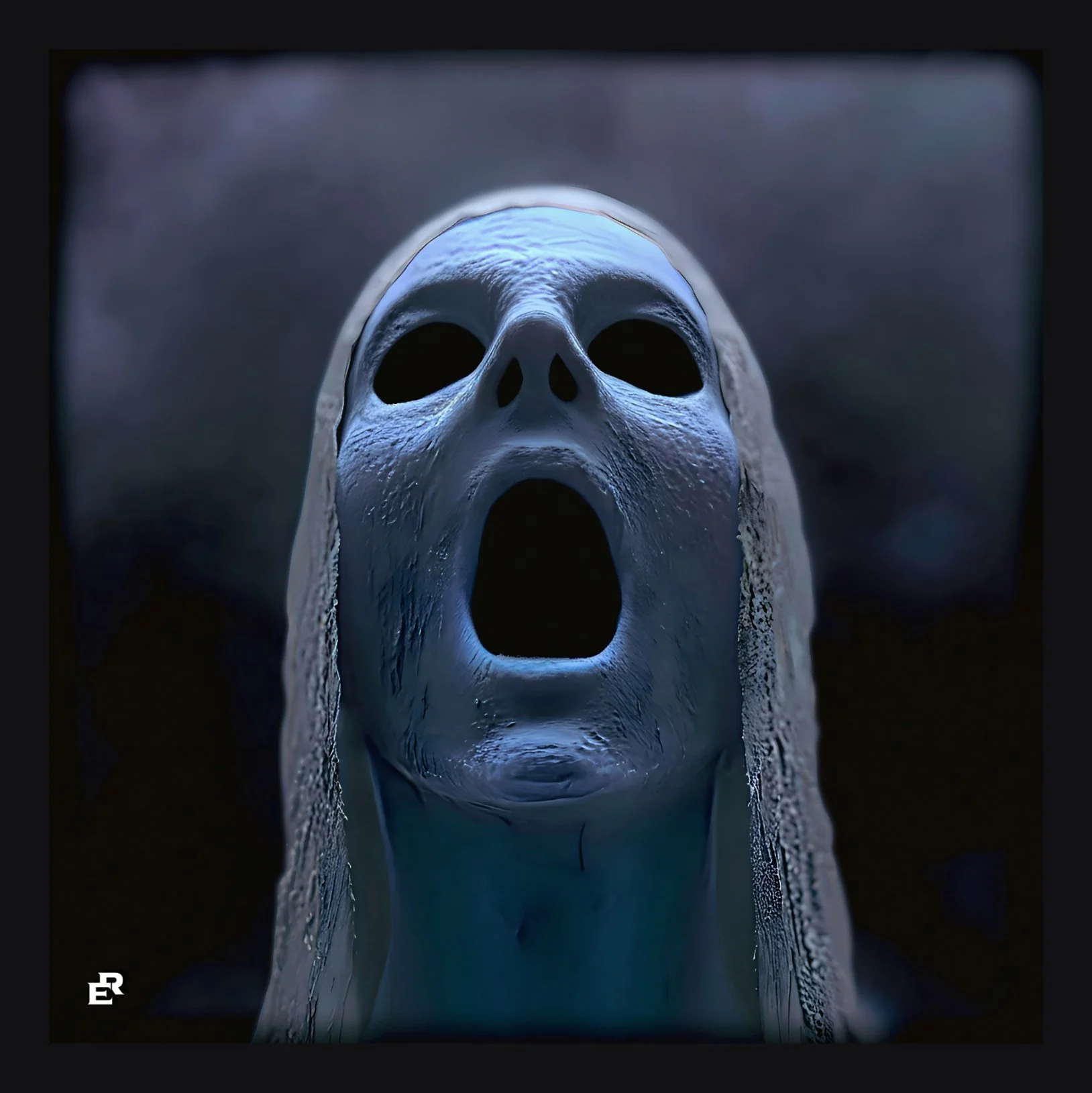 A ghostly, icy skull with hollow eye sockets and an open mouth, depicted with a blue and black color scheme, photographed in a mirror reflection.