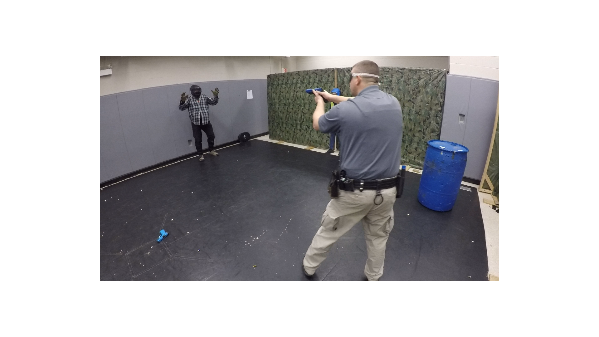 Police officer during force on force training using Simunitions.
