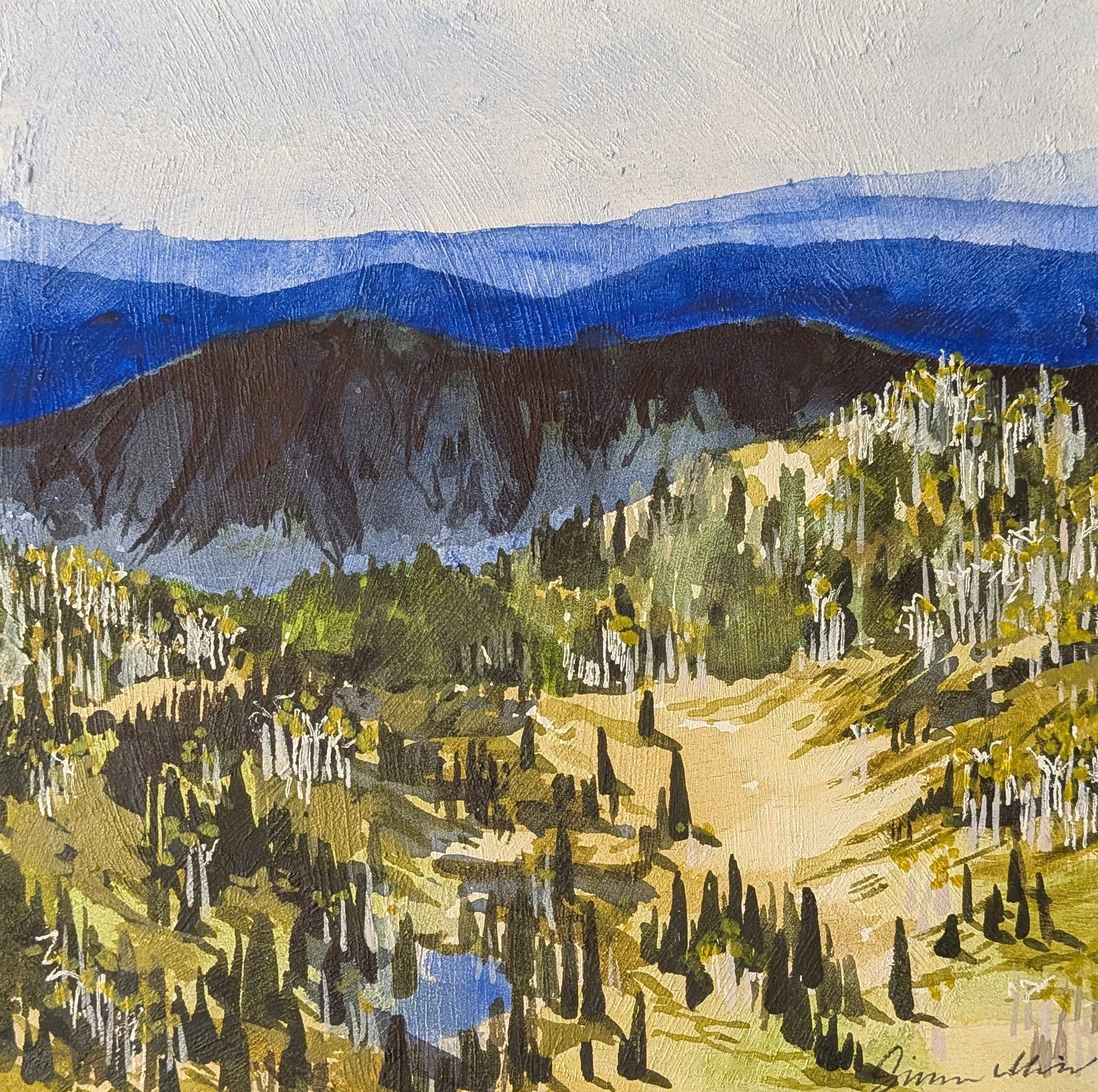 Painting of a mountain landscape with blue mountain ranges in the background, a forested middle ground, and a trail with trees in the foreground.