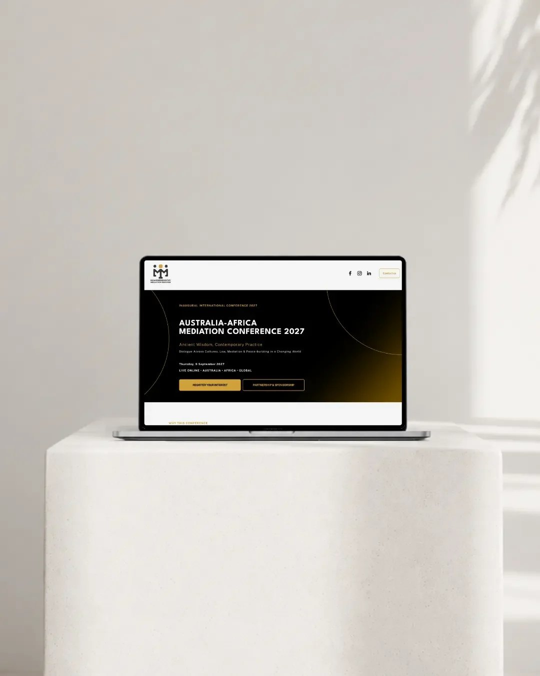 Australia–Africa Mediation Conference 2027 website design shown on a laptop mockup.