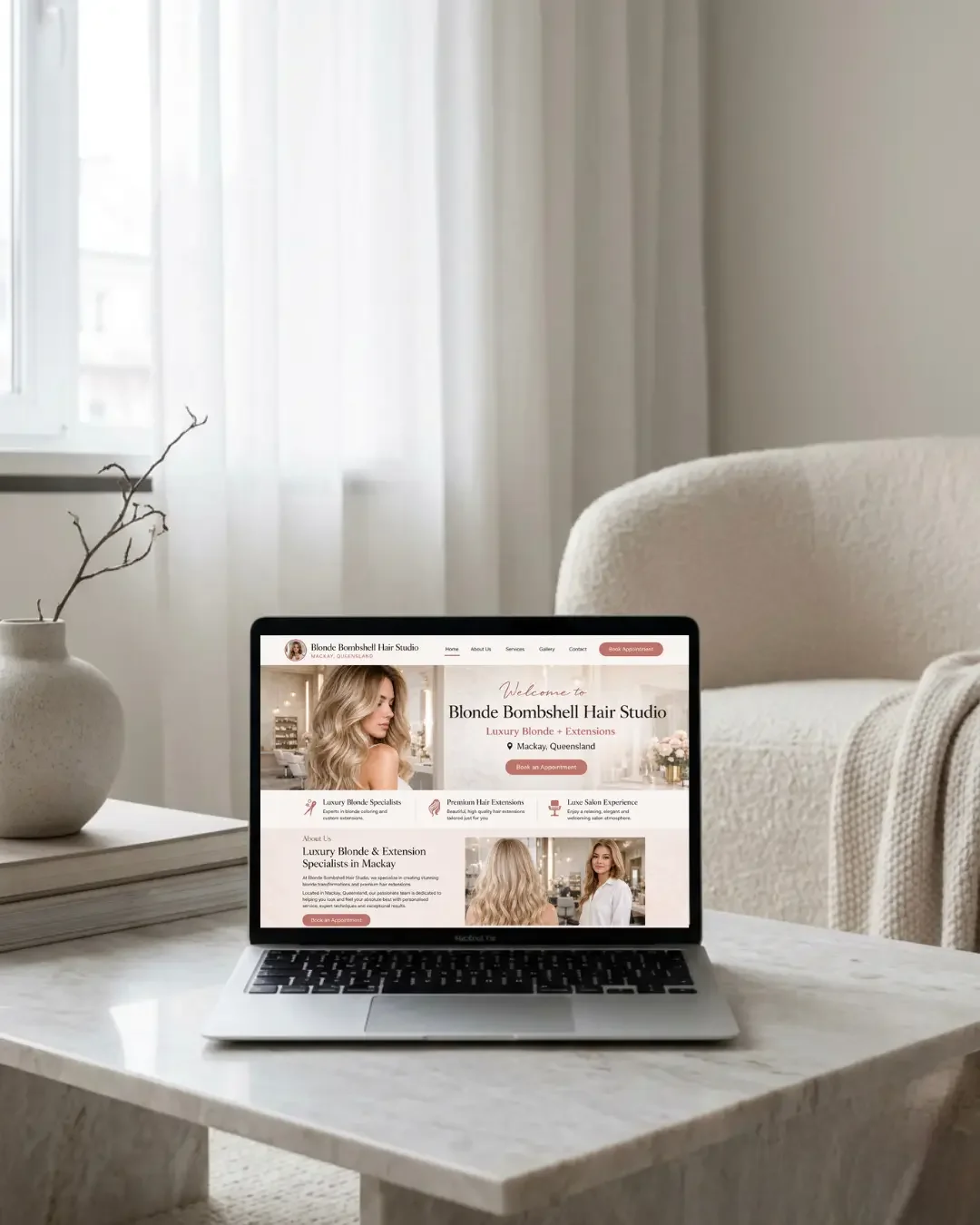 Business owner reviewing a website on a laptop, representing business website updates and website redesign services in Townsville and North Queensland.