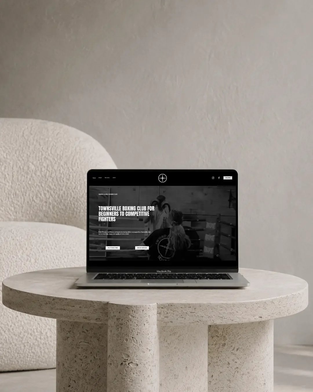 SAS Boxing Club Townsville website design displayed on a laptop mockup
