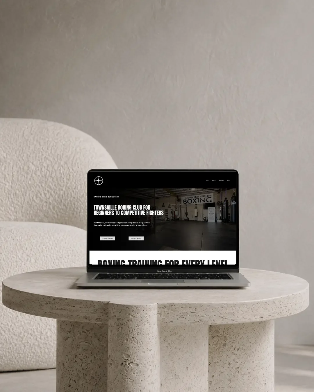 SAS Boxing Club Townsville website design displayed on a laptop mockup