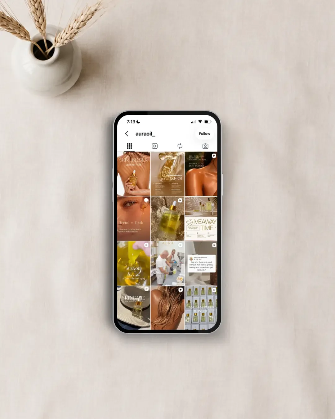 Aura Oil Instagram feed showing branded social media content created for the Townsville skincare brand