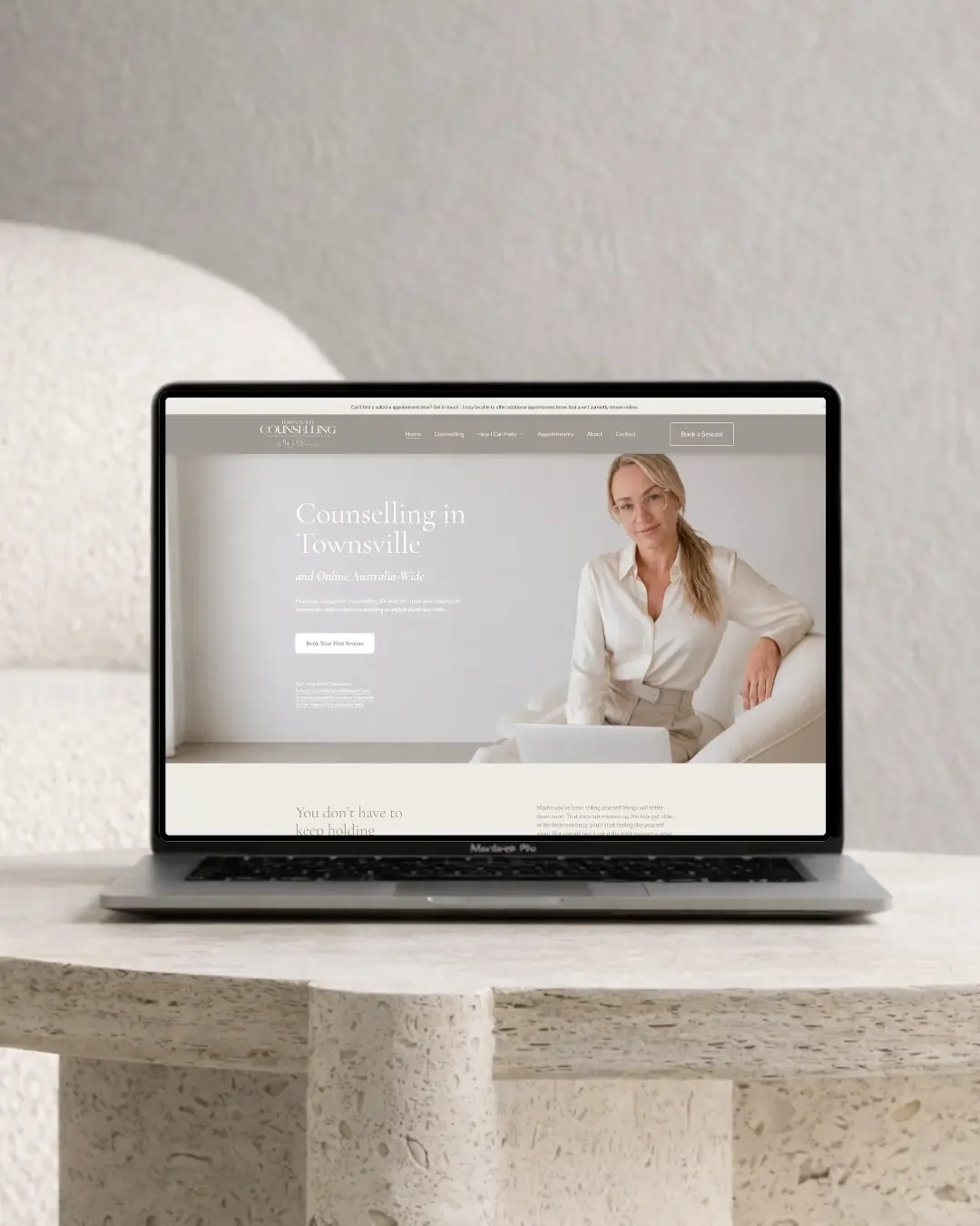 Townsville Counselling website homepage shown on a laptop, designed by NQ Social Collective