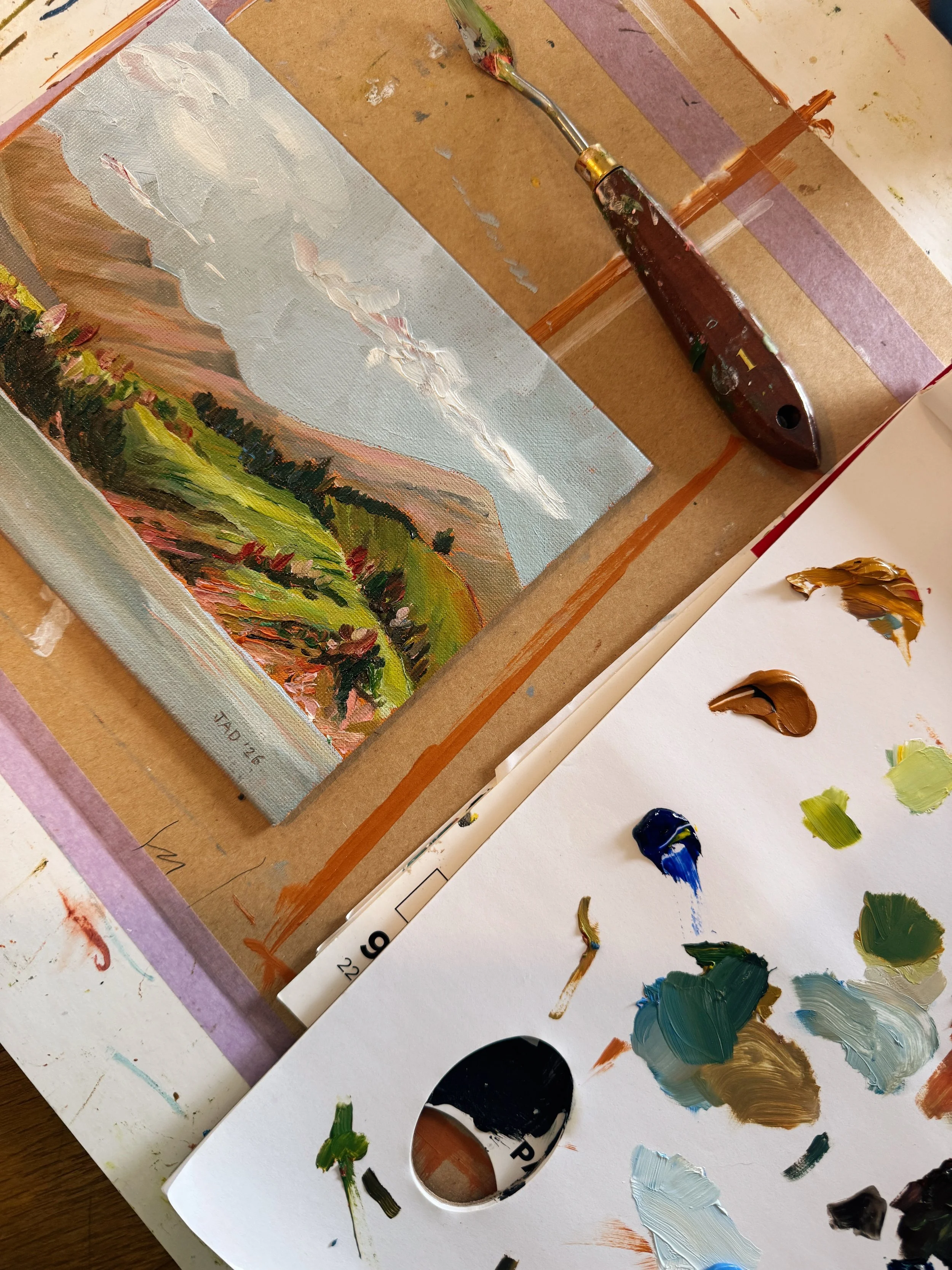 An oil painting inspired by Banks Peninsula in progress in the studio of Julia Atkinson-Dunn of Studio Home