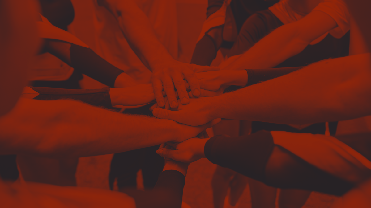 Cheerleaders with hands together