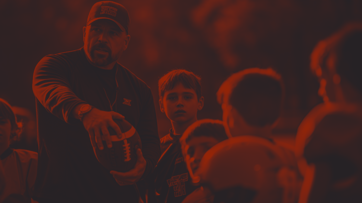 Football Coach talking to team