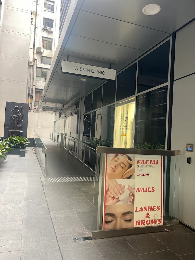 Entrance to Pain Escapes Massage therapeutic massage studio via W Skin Clinic near Martin Place, Sydney CBD, helping clients easily locate their massage appointment.