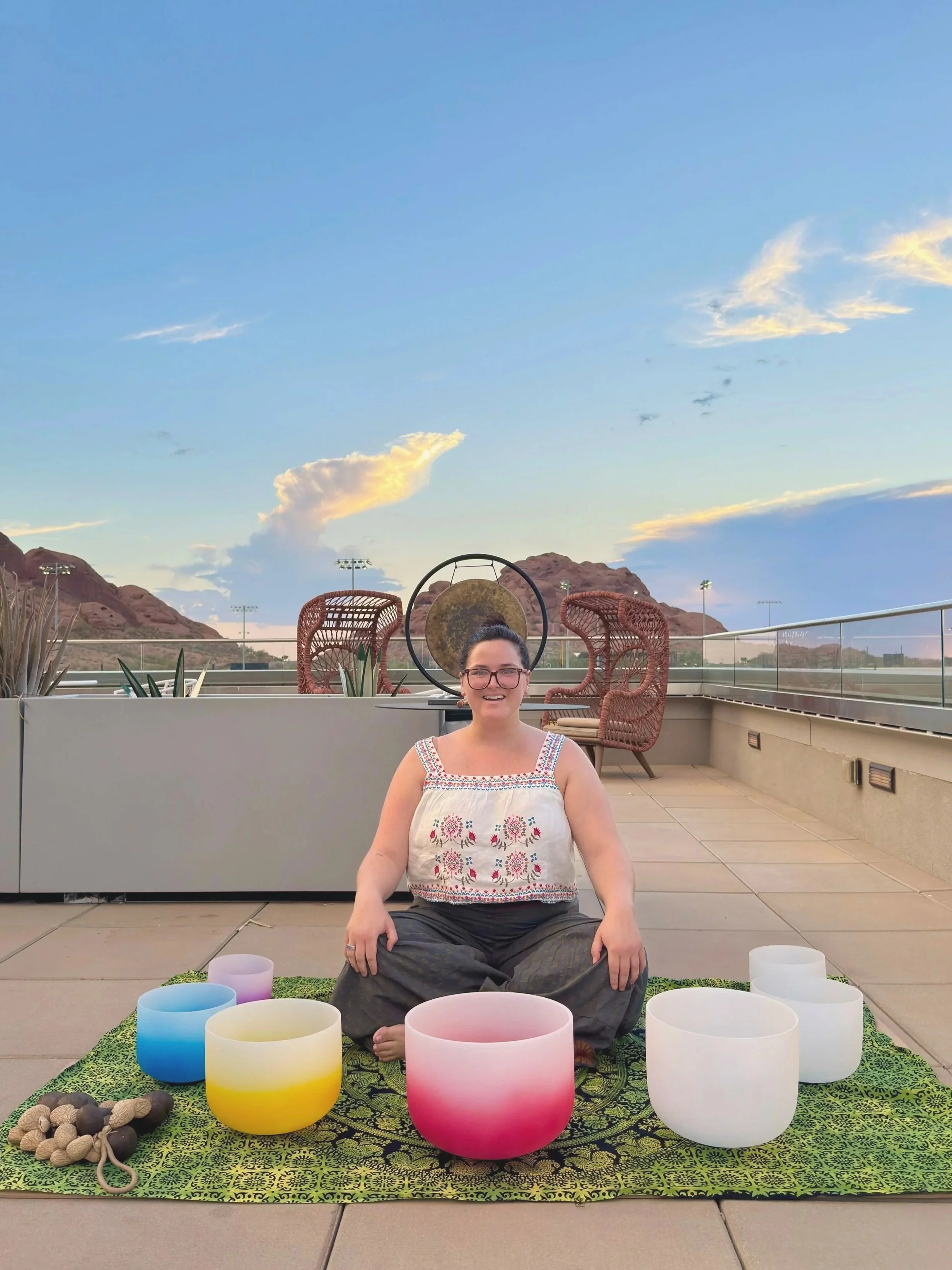 Sonoran Flow Owner With Crystal Sound Bowls and Gongs at Sunset in front of Papago Park's Papago Buttes in Scottsdale, AZ