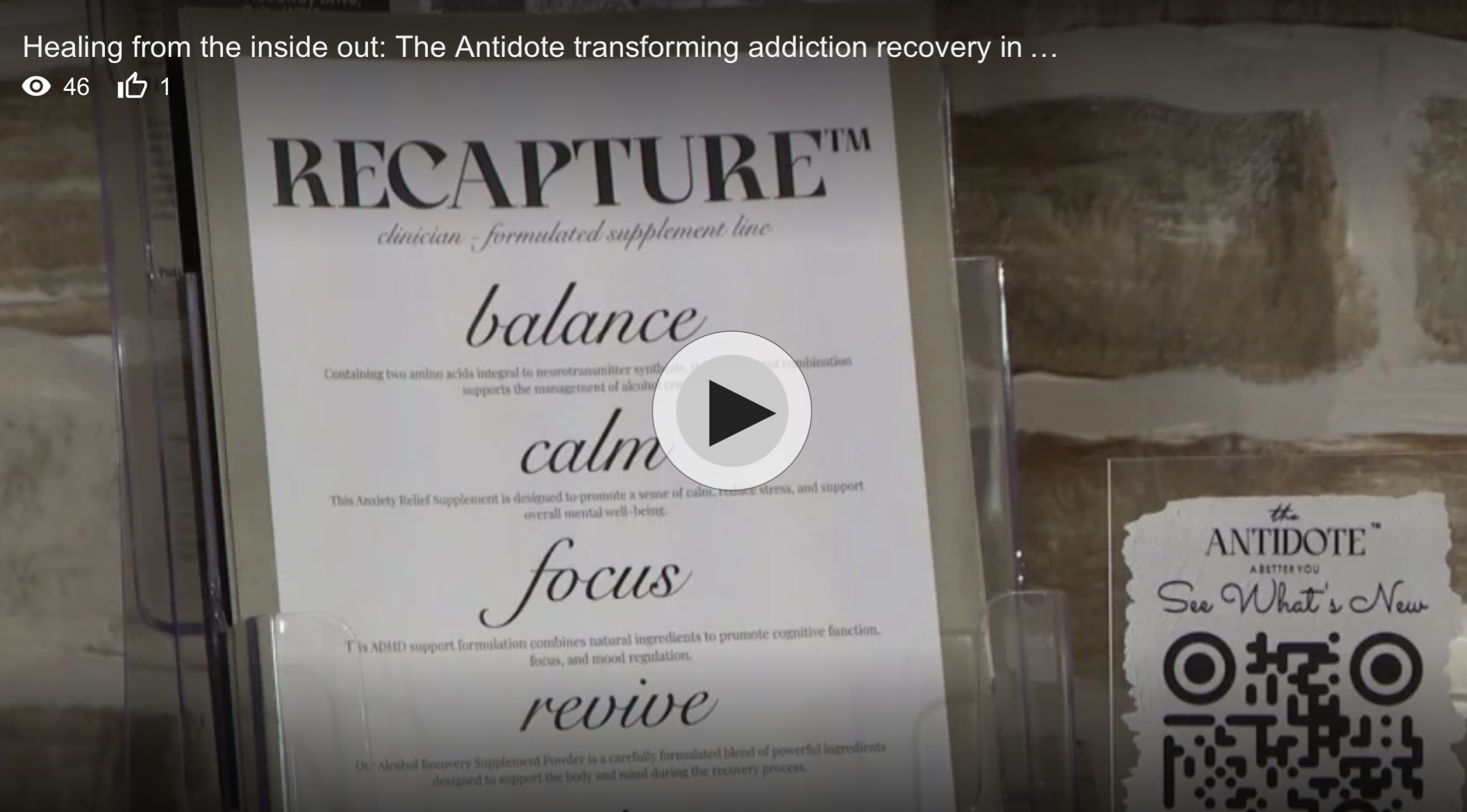 Close-up of an informational display about a supplement called RECAPTURE, featuring text about its purpose to promote calm and focus, with a QR code on the right side.