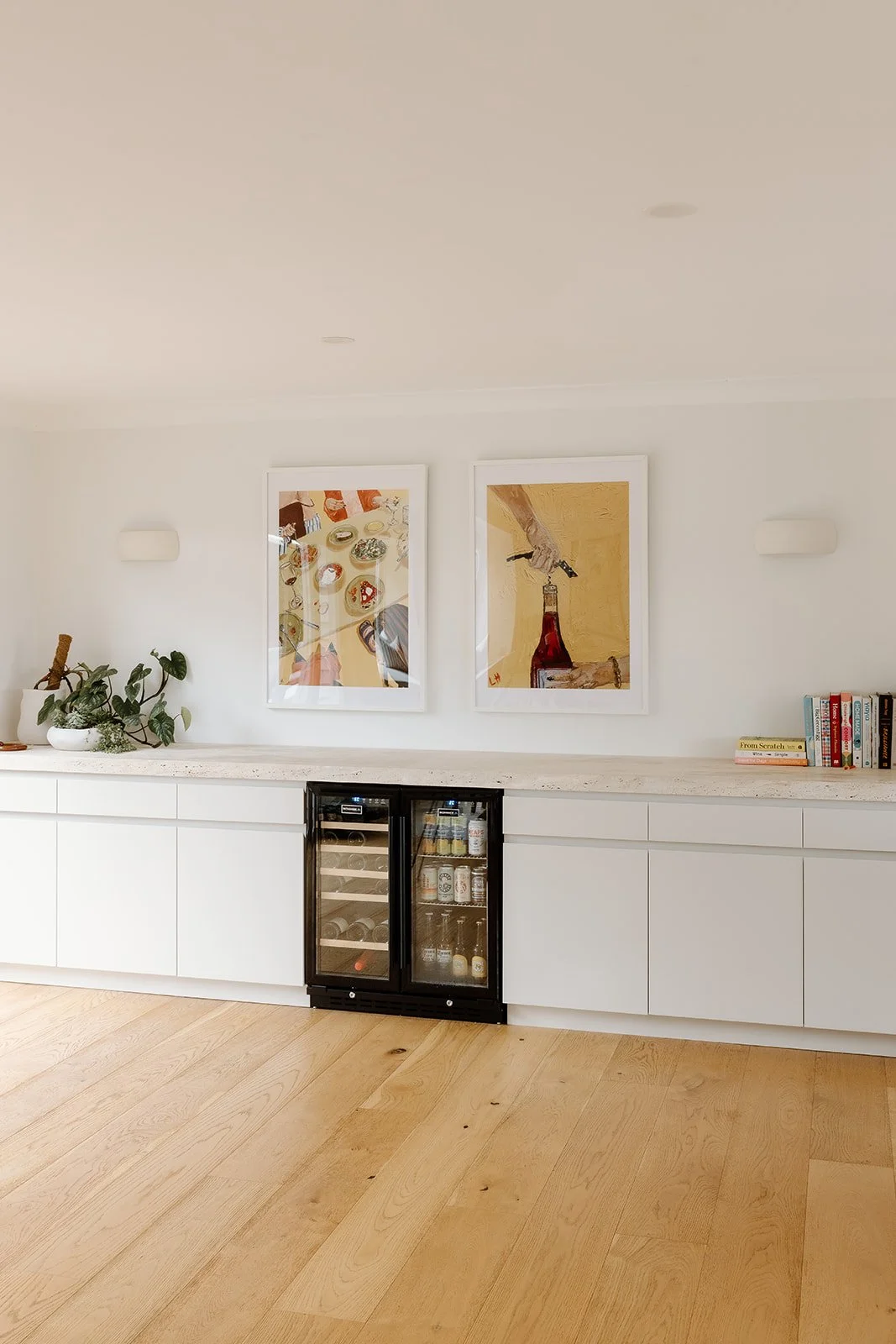 Living and dining space Wamberal Central Coast with natural materials and warm tones. 