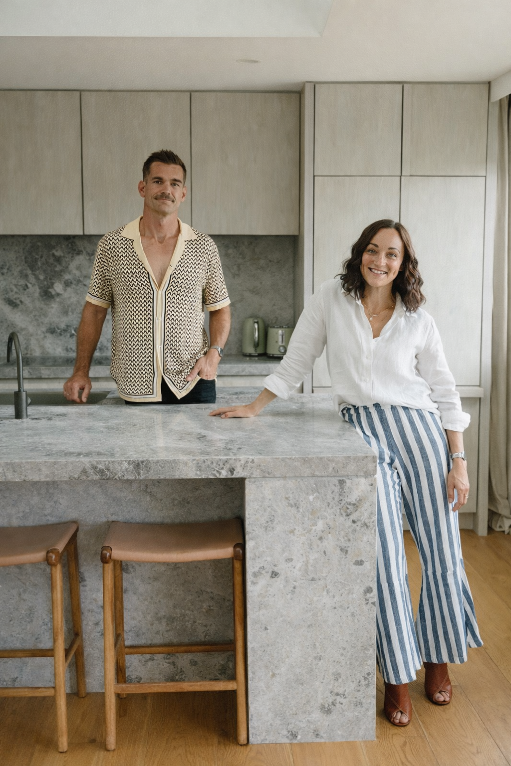Everyday Designs founders standing in a kitchen renovation space, Central Coast NSW