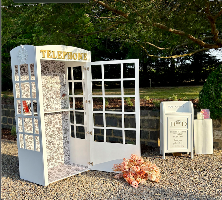 White collapsible wedding wishing well mailbox styled like a post box—used for collecting cards and messages at weddings and events. Customisable panel, flat-pack design, available for hire in Melbourne.