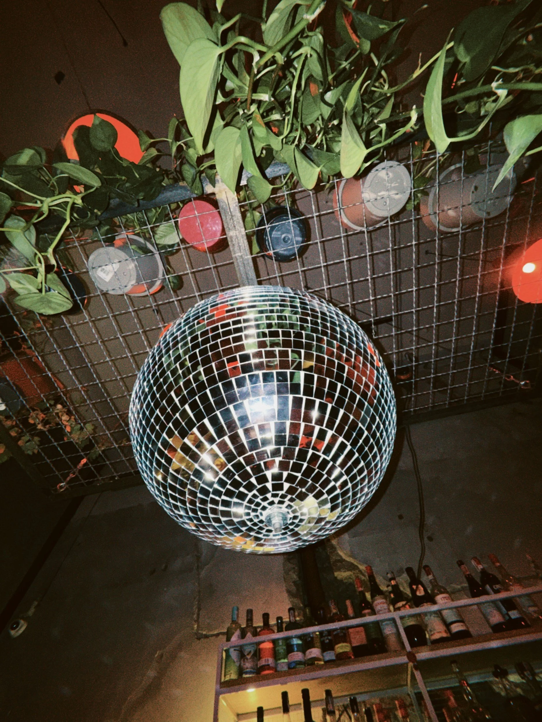 Event venue with disco ball and string lights - wedding and event content creation in Los Angeles by Never Tell Moments