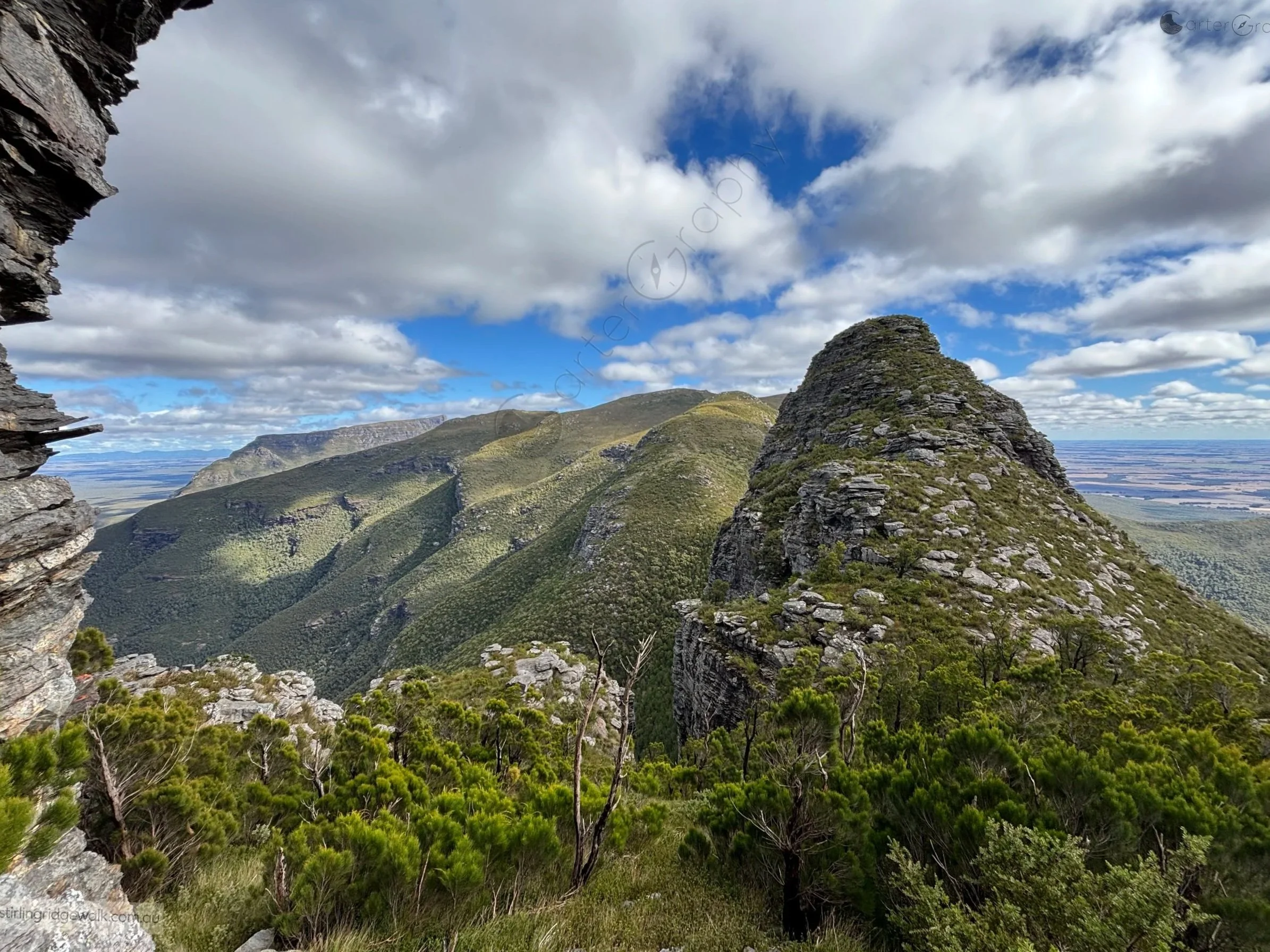 Taken from  2nd Arrow, with 1st Arrow prominent in the foreground. Isongerup Peak rises in the centre background, with Bluff Knoll visible in the distance.