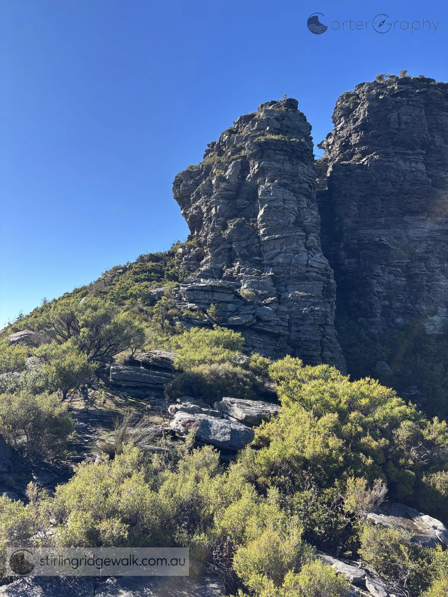 Looking east from the intermediate ridge towards the North West Pinnacle, with the summit of 1st Arrow rising to the right.