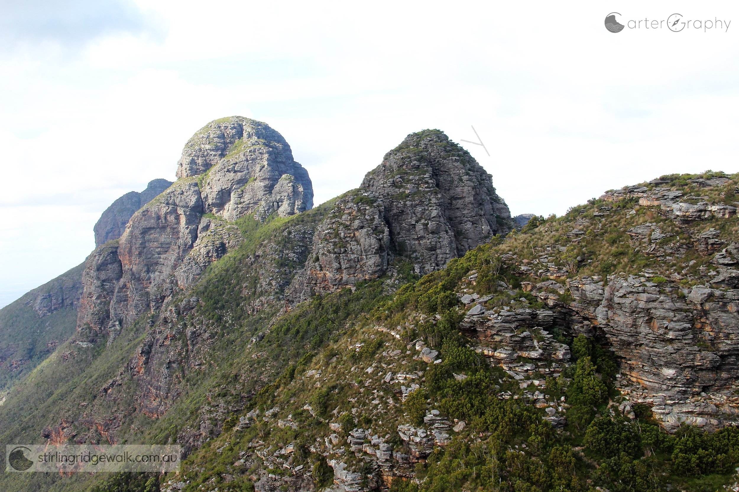 Taken from the summit of 1st Arrow, looking east across 2nd Arrow and 3rd Arrow towards Pyungoorup Peak, with the summit of Ellen Peak just visible behind.