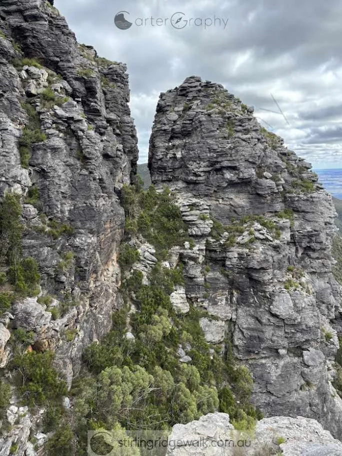 Looking west from the top of East Pinnacle Gully, with North Buttress on the right and Central Buttress on the left. Central Gully drops between the two rock formations.