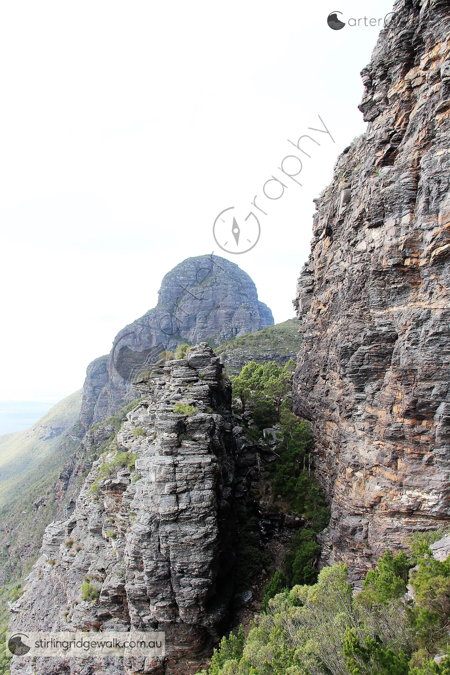 Looking east from the top of Central Gully towards East Pinnacle Gully, which cuts between East Buttress and East Pinnacle. Beyond are the slopes of Baker’s Knob and the imposing mass of Pyungoorup Peak, while Ellen Peak is obscured behind it.